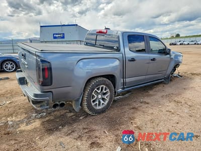 Trzecie zdjęcie samochodu z tyłu: 2021 GMC CANYON AT4 VIN:1GTG6FENXM1116164 - miniatura