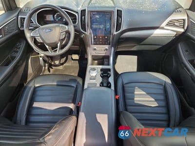Zdjęcie 8 z 13 samochodu: 2021 FORD EDGE SEL VIN:2FMPK4J90MBA60132 - miniatura