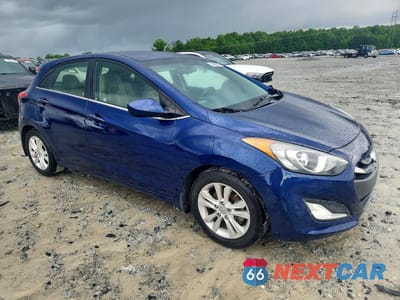 Czwarte zdjęcie samochodu z boku: 2013 HYUNDAI ELANTRA GT BASE VIN:KMHD35LE6DU111806 - miniatura