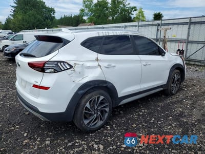 Trzecie zdjęcie samochodu z tyłu: 2019 HYUNDAI TUCSON SPORT VIN:KM8J3CALXKU848979 - miniatura