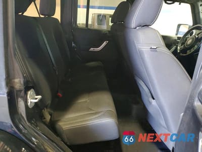 Zdjęcie 10 z 12 samochodu: 2015 JEEP WRANGLER UNLIMITED SAHARA VIN:1C4HJWEG5FL732964 - miniatura
