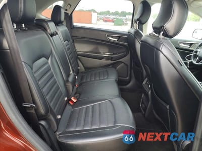 Zdjęcie 11 z 13 samochodu: 2015 FORD EDGE SEL VIN:2FMTK4J91FBB72200 - miniatura