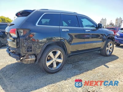 Trzecie zdjęcie samochodu z tyłu: 2014 JEEP GRAND CHEROKEE OVERLAND VIN:1C4RJECG3EC164519 - miniatura