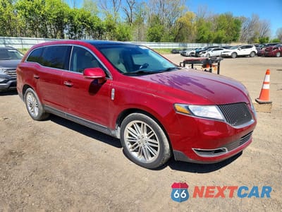 Czwarte zdjęcie samochodu z boku: 2014 LINCOLN MKT VIN:2LMHJ5AT1EBL58073 - miniatura