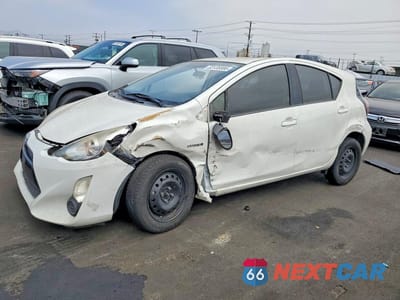 2015 TOYOTA PRIUS C TWO JTDKDTB35F1583173 - główne zdjęcie licytacji z USA - miniatura