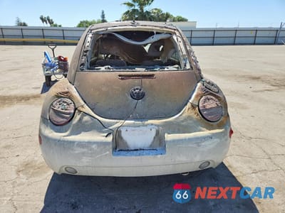Zdjęcie 6 z 12 samochodu: 1999 VOLKSWAGEN NEW BEETLE GLS VIN:3VWCC21C8XM405553 - miniatura