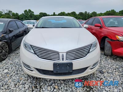Piąte zdjęcie samochodu w środku: 2016 LINCOLN MKZ HYBRID VIN:3LN6L2LU3GR612694 - miniatura