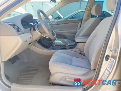 Zdjęcie 7 z 12 samochodu: 2003 TOYOTA CAMRY LE VIN:4T1BE32K73U700262 - miniatura