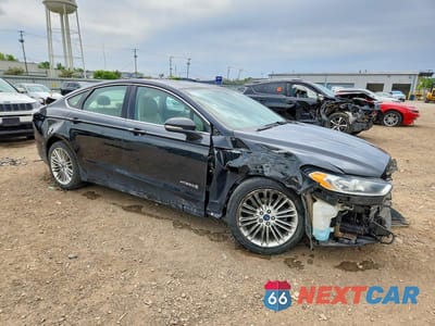 Czwarte zdjęcie samochodu z boku: 2014 FORD FUSION SE HYBRID VIN:3FA6P0LU1ER174659 - miniatura