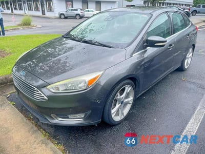 Drugie zdjęcie samochodu z przodu: 2015 FORD FOCUS TITANIUM VIN:1FADP3J23FL312020 - miniatura