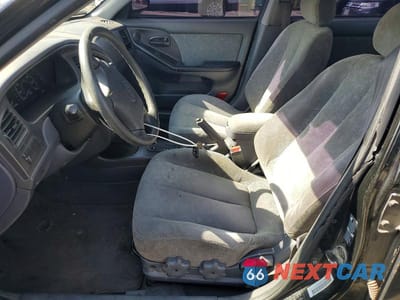 Zdjęcie 7 z 12 samochodu: 2003 HYUNDAI ELANTRA GLS VIN:KMHDN45D83U532448 - miniatura