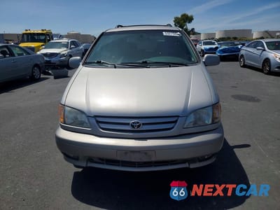 Piąte zdjęcie samochodu w środku: 2003 TOYOTA SIENNA XLE VIN:4T3ZF13CX3U520496 - miniatura