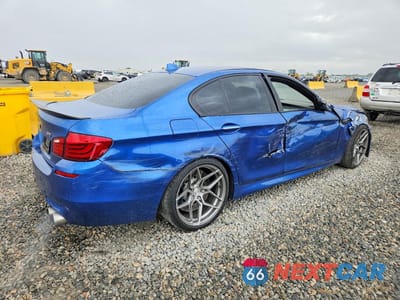 Trzecie zdjęcie samochodu z tyłu: 2013 BMW M5 VIN:WBSFV9C56DD095646 - miniatura
