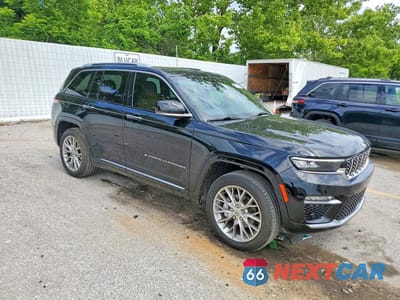 Czwarte zdjęcie samochodu z boku: 2023 JEEP GRAND CHEROKEE SUMMIT VIN:1C4RJHEG4PC563229 - miniatura