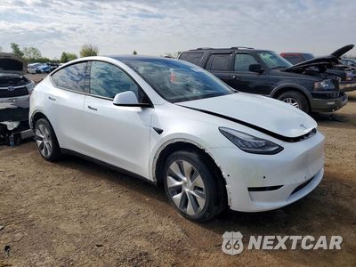 Czwarte zdjęcie samochodu z boku: 2021 TESLA MODEL Y VIN:5YJYGDEEXMF296095 - miniatura