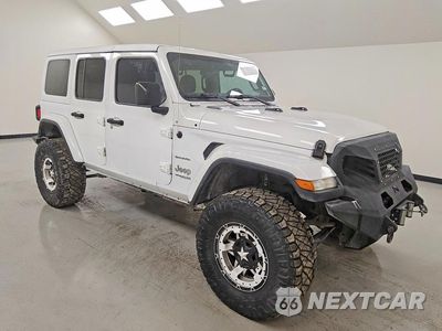 Czwarte zdjęcie samochodu z boku: 2018 JEEP WRANGLER UNLIMITED SAHARA VIN:1C4HJXEG3JW193631 - miniatura
