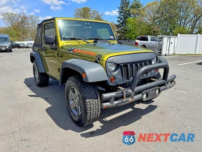 Czwarte zdjęcie samochodu z boku: 2010 JEEP WRANGLER SPORT VIN:1J4AA2D16AL201301 - miniatura