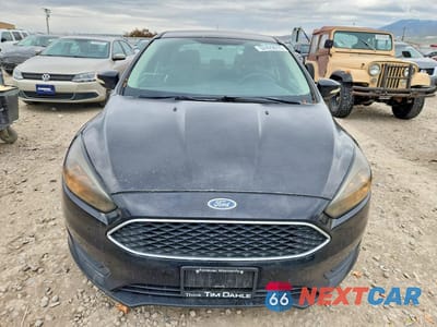 Piąte zdjęcie samochodu w środku: 2016 FORD FOCUS SE VIN:1FADP3F2XGL286459 - miniatura