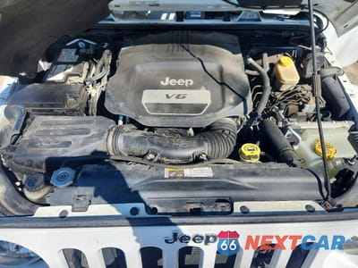 Zdjęcie 12 z 13 samochodu: 2015 JEEP WRANGLER UNLIMITED SAHARA VIN:1C4BJWEG0FL516400 - miniatura