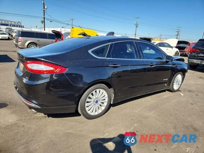 Trzecie zdjęcie samochodu z tyłu: 2015 FORD FUSION SE HYBRID VIN:3FA6P0LU1FR214160 - miniatura