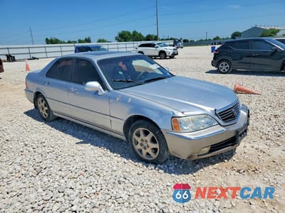 Czwarte zdjęcie samochodu z boku: 2002 ACURA 3.5RL VIN:JH4KA96512C006533 - miniatura