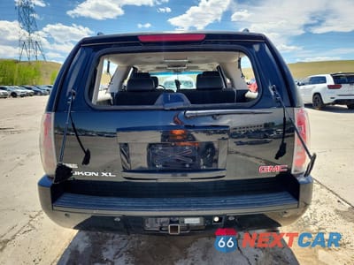 Zdjęcie 6 z 13 samochodu: 2011 GMC YUKON XL DENALI VIN:1GKS2MEF0BR311227 - miniatura