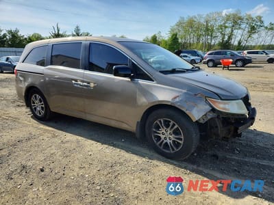 Czwarte zdjęcie samochodu z boku: 2012 HONDA ODYSSEY EXL VIN:5FNRL5H6XCB128160 - miniatura