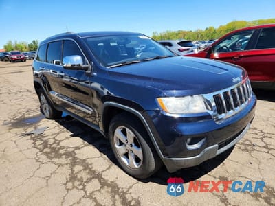 Czwarte zdjęcie samochodu z boku: 2011 JEEP GRAND CHEROKEE LAREDO VIN:1J4RR4GG4BC527414 - miniatura