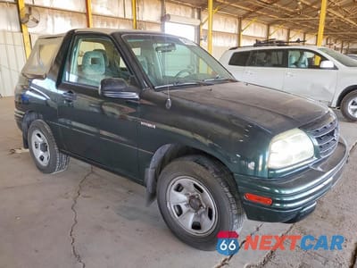 Czwarte zdjęcie samochodu z boku: 2002 SUZUKI VITARA JLS VIN:2S3TC52C426100073 - miniatura