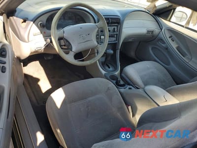 Zdjęcie 8 z 12 samochodu: 1999 FORD MUSTANG VIN:1FAFP4043XF193810 - miniatura