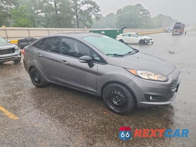 Czwarte zdjęcie samochodu z boku: 2014 FORD FIESTA SE VIN:3FADP4BJ4EM234677 - miniatura