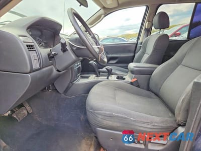 Zdjęcie 7 z 13 samochodu: 2004 JEEP GRAND CHEROKEE LAREDO VIN:1J4GW48S24C116843 - miniatura