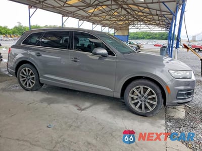 Czwarte zdjęcie samochodu z boku: 2017 AUDI Q7 PREMIUM PLUS VIN:WA1LAAF73HD034727 - miniatura