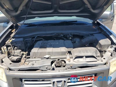 Zdjęcie 11 z 12 samochodu: 2008 HONDA RIDGELINE RTS VIN:2HJYK16408H513622 - miniatura