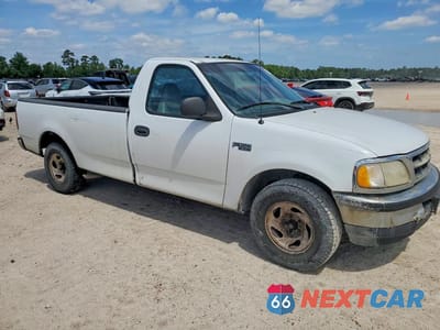 Czwarte zdjęcie samochodu z boku: 1997 FORD F150 VIN:1FTDF1721VKC79273 - miniatura