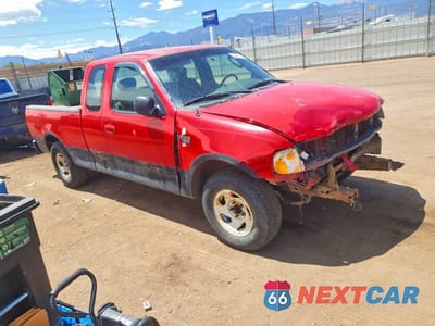 Czwarte zdjęcie samochodu z boku: 2003 FORD F150 VIN:1FTRX172X3NB39592 - miniatura