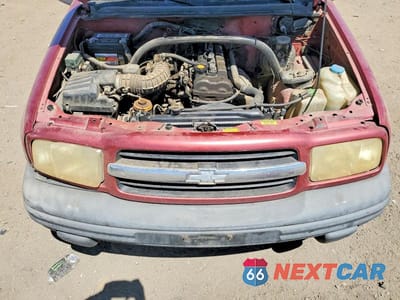 Zdjęcie 11 z 12 samochodu: 1999 CHEV TRACKER VIN:2CNBJ13C9X6912866 - miniatura