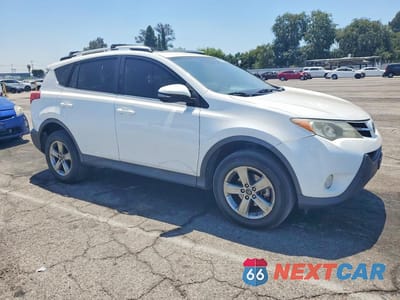 Czwarte zdjęcie samochodu z boku: 2015 TOYOTA RAV4 XLE VIN:2T3WFREV6FW207451 - miniatura