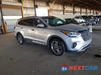 Czwarte zdjęcie samochodu z boku: 2017 HYUNDAI SANTA FE LIMITED ULTIMATE VIN:KM8SR4HF4HU218182 - miniatura