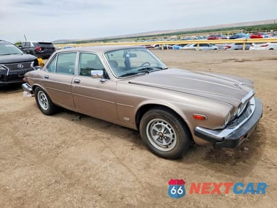 Czwarte zdjęcie samochodu z boku: 1986 JAGUAR XJ6 VANDEN PLAS VIN:SAJAY1341GC442023 - miniatura