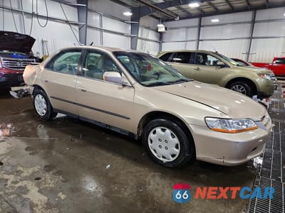 Czwarte zdjęcie samochodu z boku: 2000 HONDA ACCORD LX VIN:1HGCG564XYA128317 - miniatura