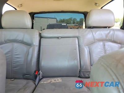 Zdjęcie 10 z 13 samochodu: 2002 CHEVROLET TAHOE K1500 VIN:1GNEK13Z42J299190 - miniatura