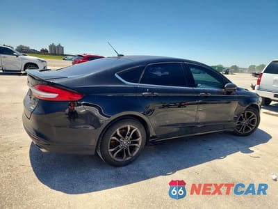 Trzecie zdjęcie samochodu z tyłu: 2018 FORD FUSION SE VIN:3FA6P0HD2JR265233 - miniatura