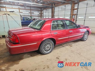 Trzecie zdjęcie samochodu z tyłu: 2000 MERCURY GRAND MARQUIS GS VIN:2MEFM74W5YX662299 - miniatura