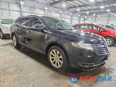 Czwarte zdjęcie samochodu z boku: 2019 LINCOLN MKT VIN:2LMHJ5AT0KBL01648 - miniatura