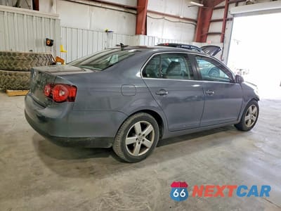 Trzecie zdjęcie samochodu z tyłu: 2009 VOLKSWAGEN JETTA SE VIN:3VWRZ71K19M092135 - miniatura