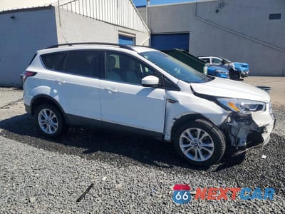 Czwarte zdjęcie samochodu z boku: 2018 FORD ESCAPE SEL VIN:1FMCU9HD2JUC72715 - miniatura