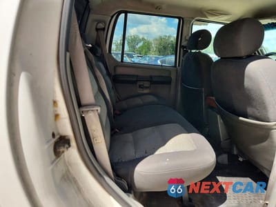 Zdjęcie 11 z 13 samochodu: 2003 FORD EXPLORER SPORT TRAC VIN:1FMZU67E23UB07141 - miniatura