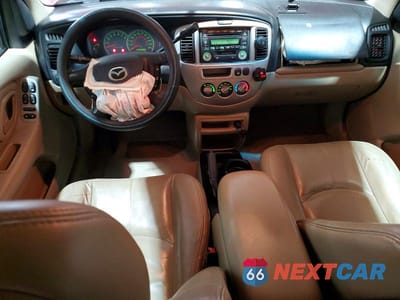 Zdjęcie 8 z 13 samochodu: 2004 MAZDA TRIBUTE ES VIN:4F2CZ06104KM30396 - miniatura