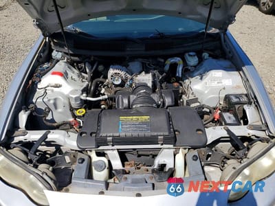 Zdjęcie 11 z 13 samochodu: 2000 CHEVROLET CAMARO VIN:2G1FP22K2Y2141719 - miniatura